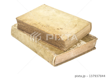Stacked old antique books with weathered parchment pages 137937844