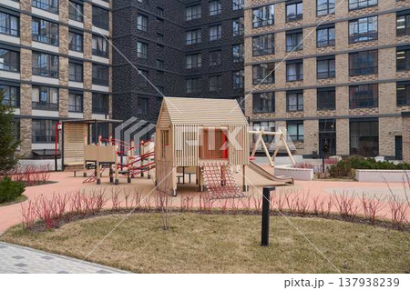 Contemporary residential outdoor space with play structures 137938239