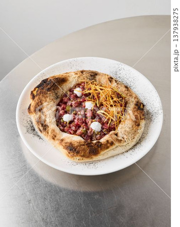 Creamy cheese and herb crumble enhance beetroot pizza presentation Creamy cheese and herb crumble enhance beetroot pizza presentation 137938275