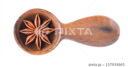 Star anise isolated on white background. Anise stars or badian spice in wooden spoon. Clipping path. Top view. Star anise isolated on white background. Anise stars or badian spice in wooden spoon. Clipping path. Top view. 137939865