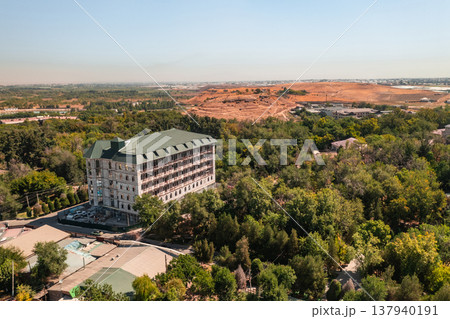Luxury Resort Surrounded By Natural Beauty. Scenic Spa Hideaway Amid Lush Green Landscapes Luxury Resort Surrounded By Natural Beauty. Scenic Spa Hideaway Amid Lush Green Landscapes 137940191