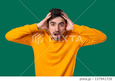 Yelling Angry Man Heard Bad News. Young Guy Screaming, Fear, Shock On Green 137941726