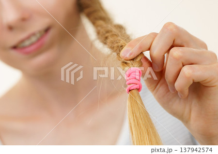 Blonde girl with braid hair Blonde girl with braid hair 137942574