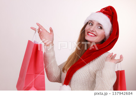 Happy girl on christmas shopping. Happy girl on christmas shopping. 137942684