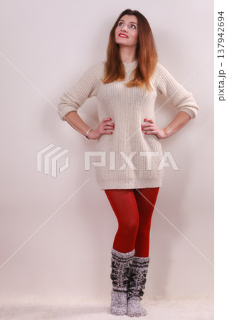 Beautiful winter woman in warm clothing Beautiful winter woman in warm clothing 137942694
