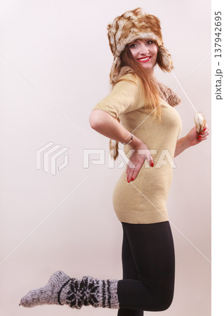 Beautiful winter woman in warm clothing 137942695
