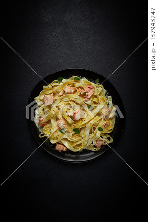 tagliatelle pasta, in cream sauce with salmon, homemade, no people, 137943247
