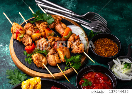 Assortment of grilled bbq meat and vegetables Assortment of grilled bbq meat and vegetables 137944423