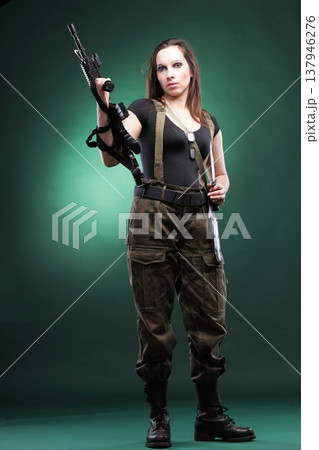 Army Woman With Gun - Beautiful woman with rifle plastic Army Woman With Gun - Beautiful woman with rifle plastic 137946276