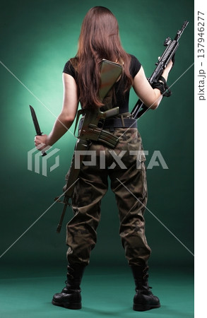 Army Woman With Gun - Beautiful woman with rifle plastic Army Woman With Gun - Beautiful woman with rifle plastic 137946277