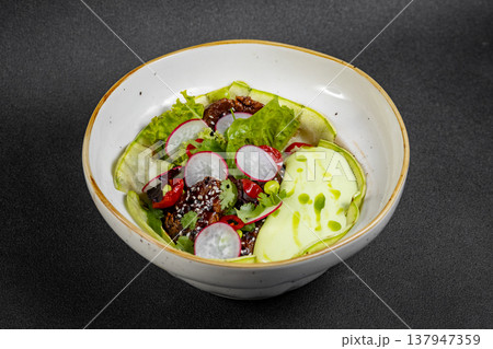 Fresh vegetable salad of green lettuce, radish and cucumber with dill, green onions and greek yogurt Fresh vegetable salad of green lettuce, radish and cucumber with dill, green onions and greek yogurt 137947359