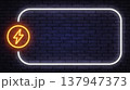 Neon electric lightning icon inside a glowing circle with large light frame. Bright energy symbol on dark brick wall background with copy space. 137947373