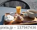 Flemish indulgent coffee set on sunny terrace 137947436