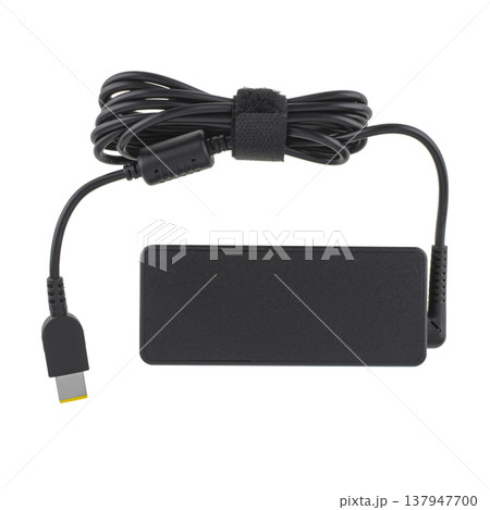 laptop power adapter, laptop spare part, isolated on white background laptop power adapter, laptop spare part, isolated on white background 137947700