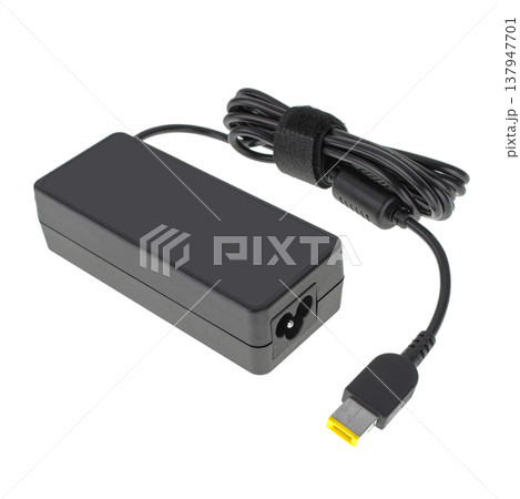 laptop power adapter, laptop spare part, isolated on white background 137947701