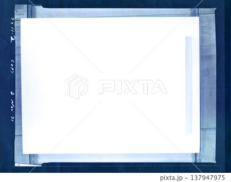 Vintage film slide frame with a white blank center for copy space on a blue background. Retro 1970s aesthetic with a date stamp 2 Nov 71, light leaks, and film grain. Ideal for photo overlays. Vintage film slide frame with a white blank center for copy space on a blue background. Retro 1970s aesthetic with a date stamp 2 Nov 71, light leaks, and film grain. Ideal for photo overlays. 137947975
