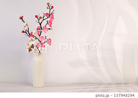 Elegant sunny colorful banner with pink blooming sakura branches in vase, abstract spring flower arrangement and template for your creative work, display table and spring concept, Elegant sunny colorful banner with pink blooming sakura branches in vase, abstract spring flower arrangement and template for your creative work, display table and spring concept, 137948294