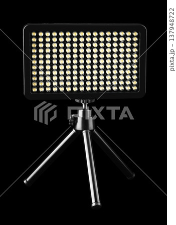 flashlight searchlight for video filming, on a black background flashlight searchlight for video filming, on a black background 137948722