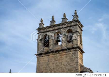 Walking along ancient streets enjoying historic architecture and charming atmosphere in Ronda, Spain. 137949131
