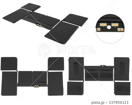 battery for a laptop, a spare part for a computer, on a white background battery for a laptop, a spare part for a computer, on a white background 137950121
