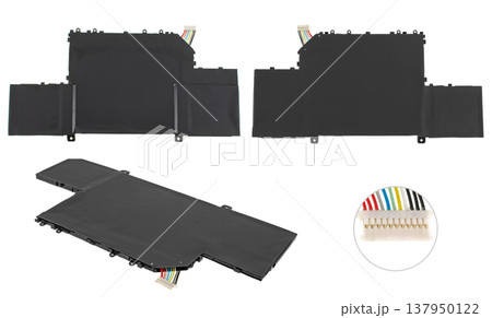battery for a laptop, a spare part for a computer, on a white background battery for a laptop, a spare part for a computer, on a white background 137950122