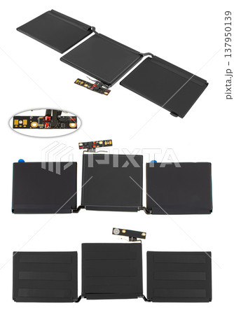 battery for a laptop, a spare part for a computer, on a white background battery for a laptop, a spare part for a computer, on a white background 137950139