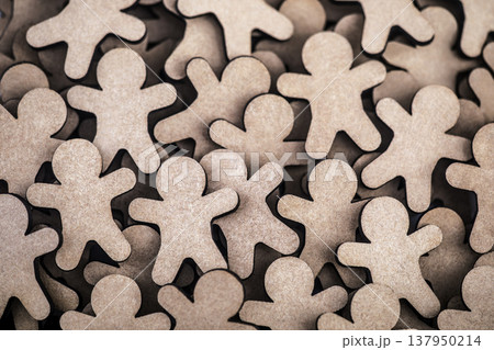 Large group of small wooden people figurines Large group of small wooden people figurines 137950214
