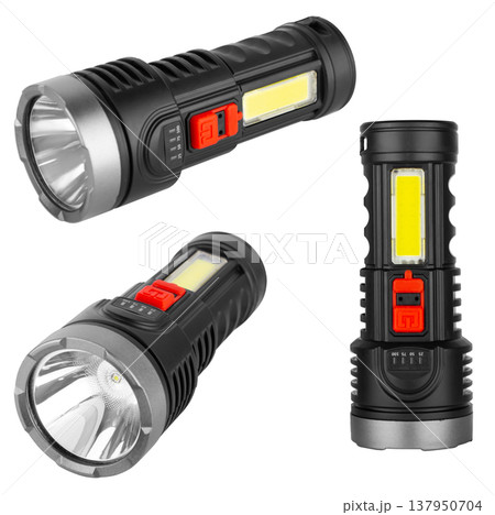 battery-powered flashlight, hand-held, on a white background battery-powered flashlight, hand-held, on a white background 137950704