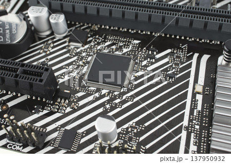 Part of a printed circuit board, close-up, a spare part from a computer Part of a printed circuit board, close-up, a spare part from a computer 137950932