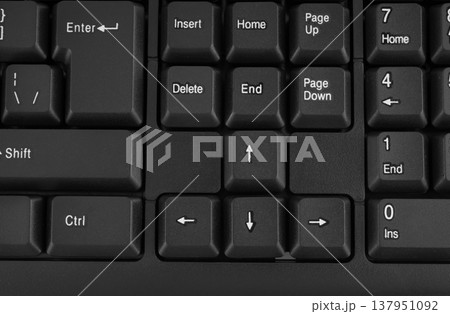 Part of a computer keyboard, black close-up Part of a computer keyboard, black close-up 137951092