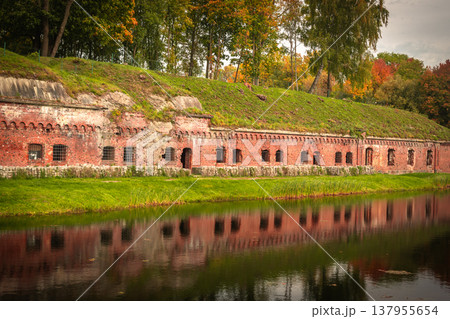 Old brick wall of Fort 5 King Frederick William III by moat in Kaliningrad. Russia 137955654