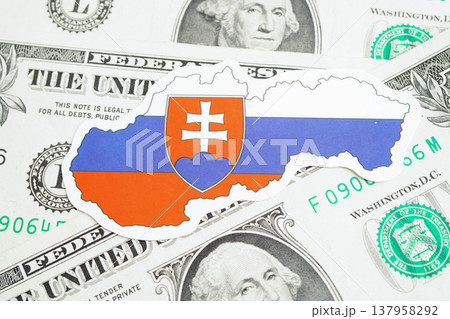 Slovakia flag on coins background, finance and accounting, banking concept. Slovakia flag on coins background, finance and accounting, banking concept. 137958292