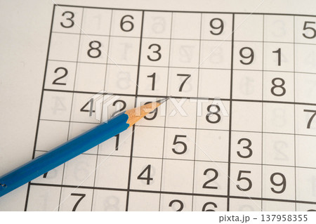 Sudoku puzzle, game to play for keep you brain younger for developing Alzheimer disease in senior patient. 137958355