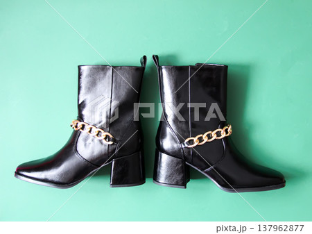High-fashion black leather boots for stylish wear. Sophisticated look and contemporary elegance. 137962877