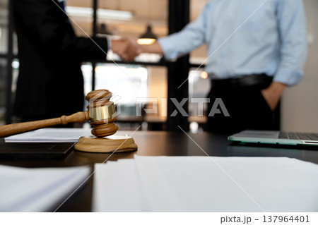 businessman lawyer standing handshake congratulating agreement businessman lawyer standing handshake congratulating agreement 137964401