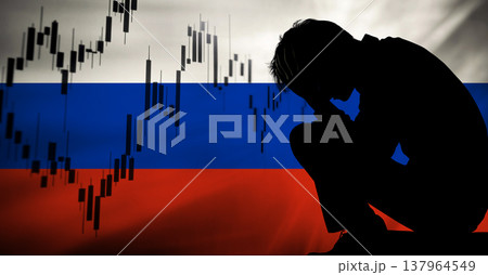 Economic crisis and unemployment in Russia concept. Silhouette of a depressed man and a falling stock market candle graph over the Russian flag background. Poverty and financial failure concept Economic crisis and unemployment in Russia concept. Silhouette of a depressed man and a falling stock market candle graph over the Russian flag background. Poverty and financial failure concept 137964549