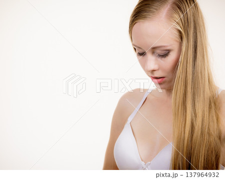 Girl wearing white bra 137964932