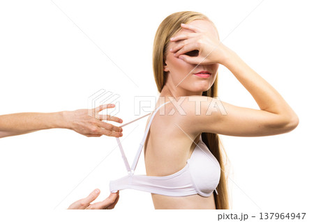 Woman wearing too big bra Woman wearing too big bra 137964947