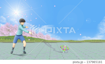 男の子が公園でアクロバット的なコマ回しをしている　(文字入れ用背景素材) 137965181