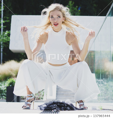 Woman wearing crop top and culottes 137965444