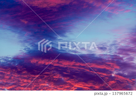 Colorful vibrant clouds on sky at sunset Colorful vibrant clouds on sky at sunset 137965672