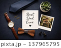 Best Dad Ever Flat Lay with Watch, Tie, Bow Tie, Cufflinks and Family Photo 137965795