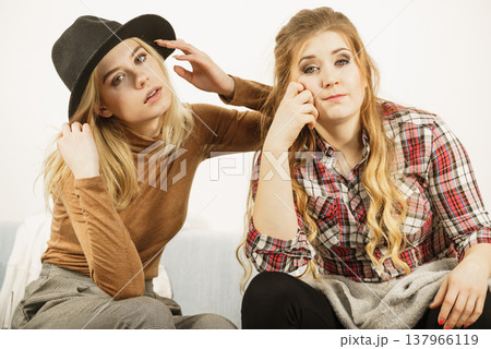 Two women being tired or bored Two women being tired or bored 137966119