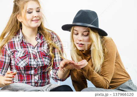 Women showing their nails Women showing their nails 137966120