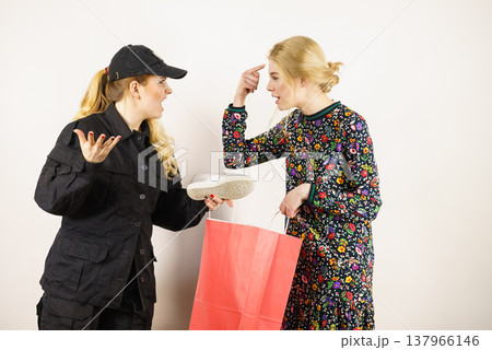 Security guard and shoplifter. 137966146