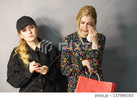 Security guard and shoplifter. 137966163