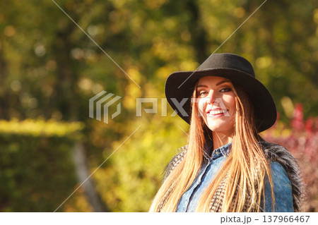 Cheerful woman having fun outdoors Cheerful woman having fun outdoors 137966467