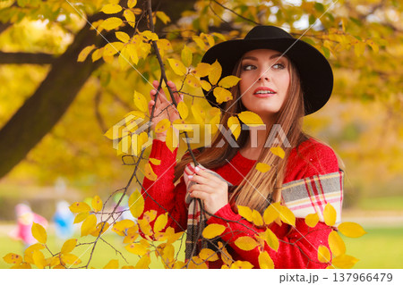 Beautiful woman in autumn park Beautiful woman in autumn park 137966479