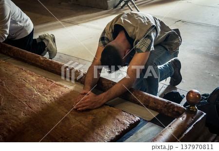 Christian pilgrims' hands on the Stone of Anointing, Holy Sepulchre. Christian pilgrims' hands on the Stone of Anointing, Holy Sepulchre. 137970811