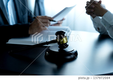 Lawyer is advising worried client using information listened 137972084